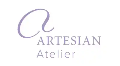 the image shows name of brand Artesian Atelier in purple with a white background