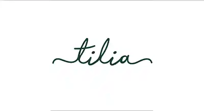 the image shows name brand Tilia in green ,and the background is white