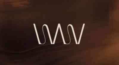 the image shows W repeated and shaded in begige color with brown background