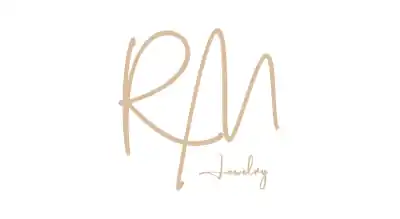 The image shows a logo with the name "RM Jewelry" written in gold letters. The background is white