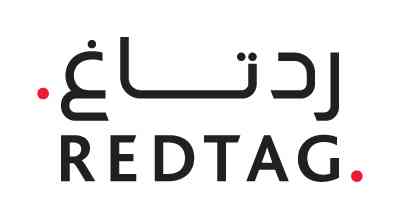 REDTAG logo showing the brand name "REDTAG" written in Arabic at the top, and Englsih at the bottom
