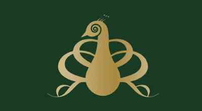 The image shiws a bird in golden color with a green background 