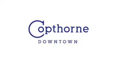 The image shows a logo with the name "Copthorne Downtown " written in blue  letters.The background is white